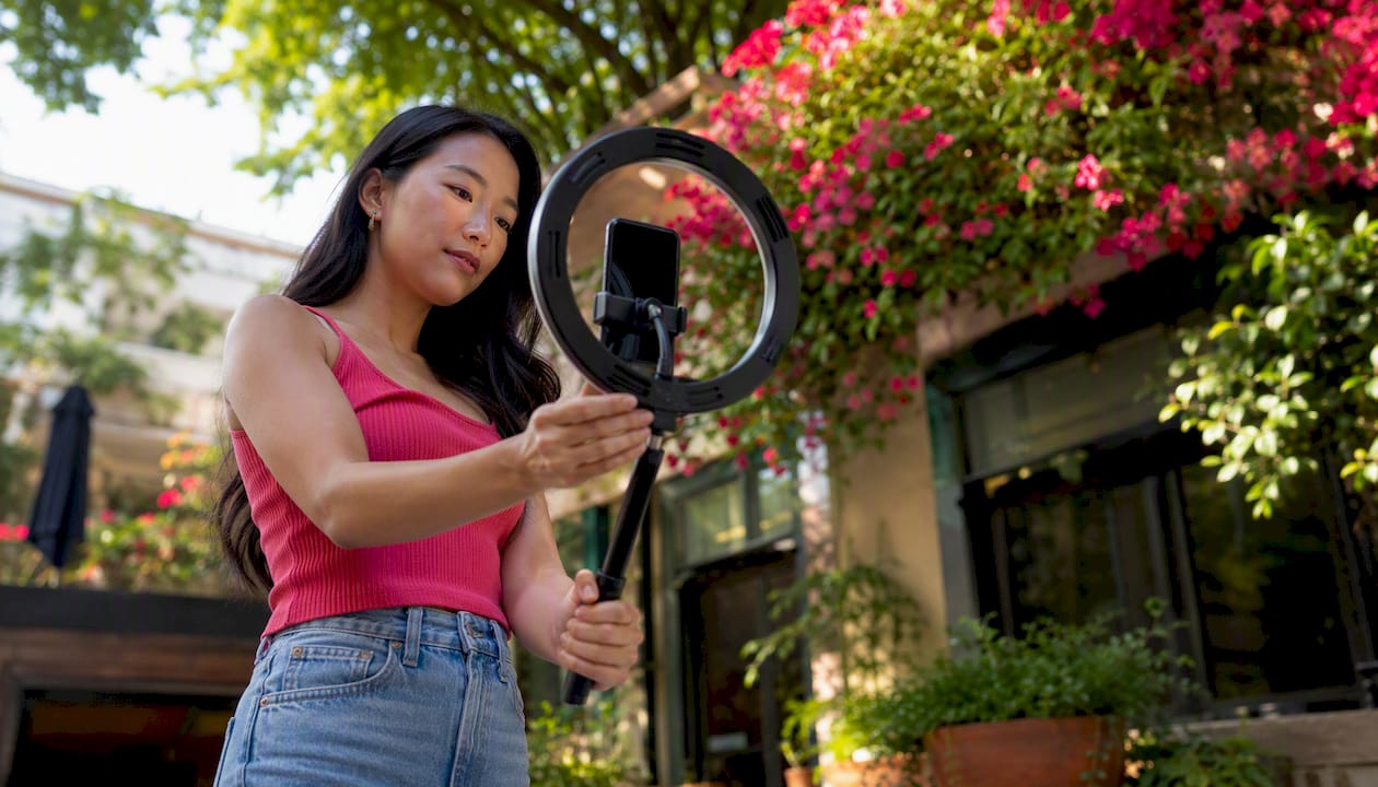 Content creator setting up TikTok video filming