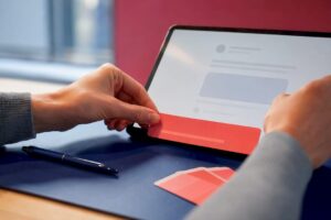 Marketer positioning CTA overlay on tablet