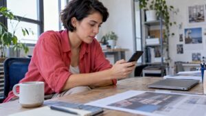 Marketer reviewing an exported PDF on phone