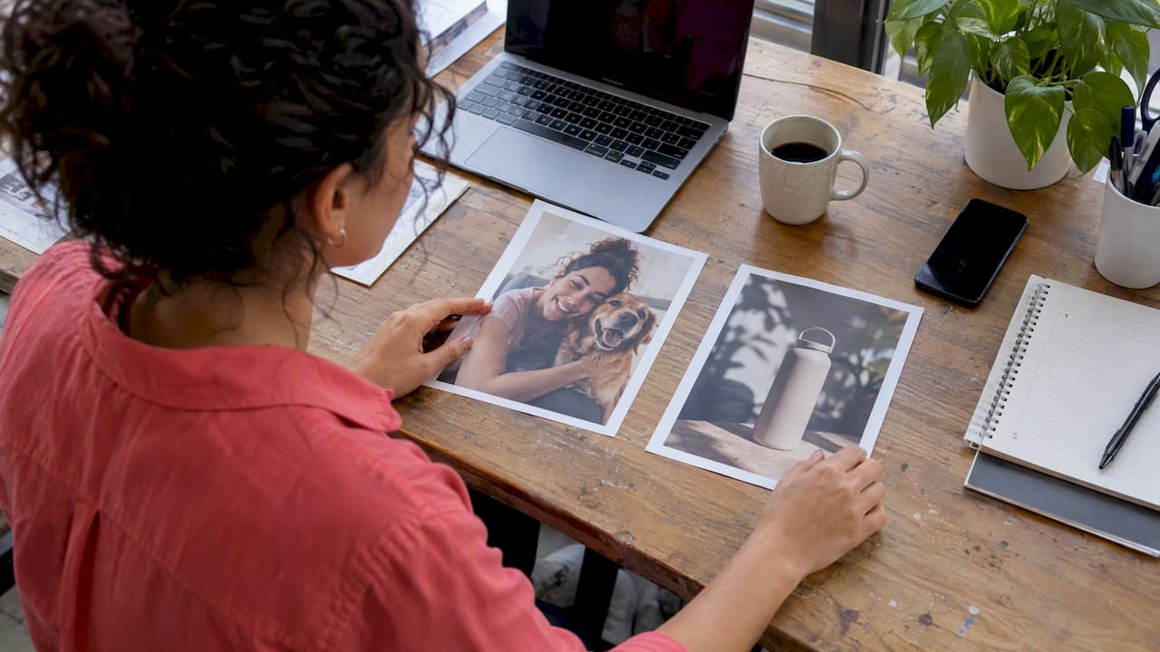 Marketer comparing customer and branded content proofs